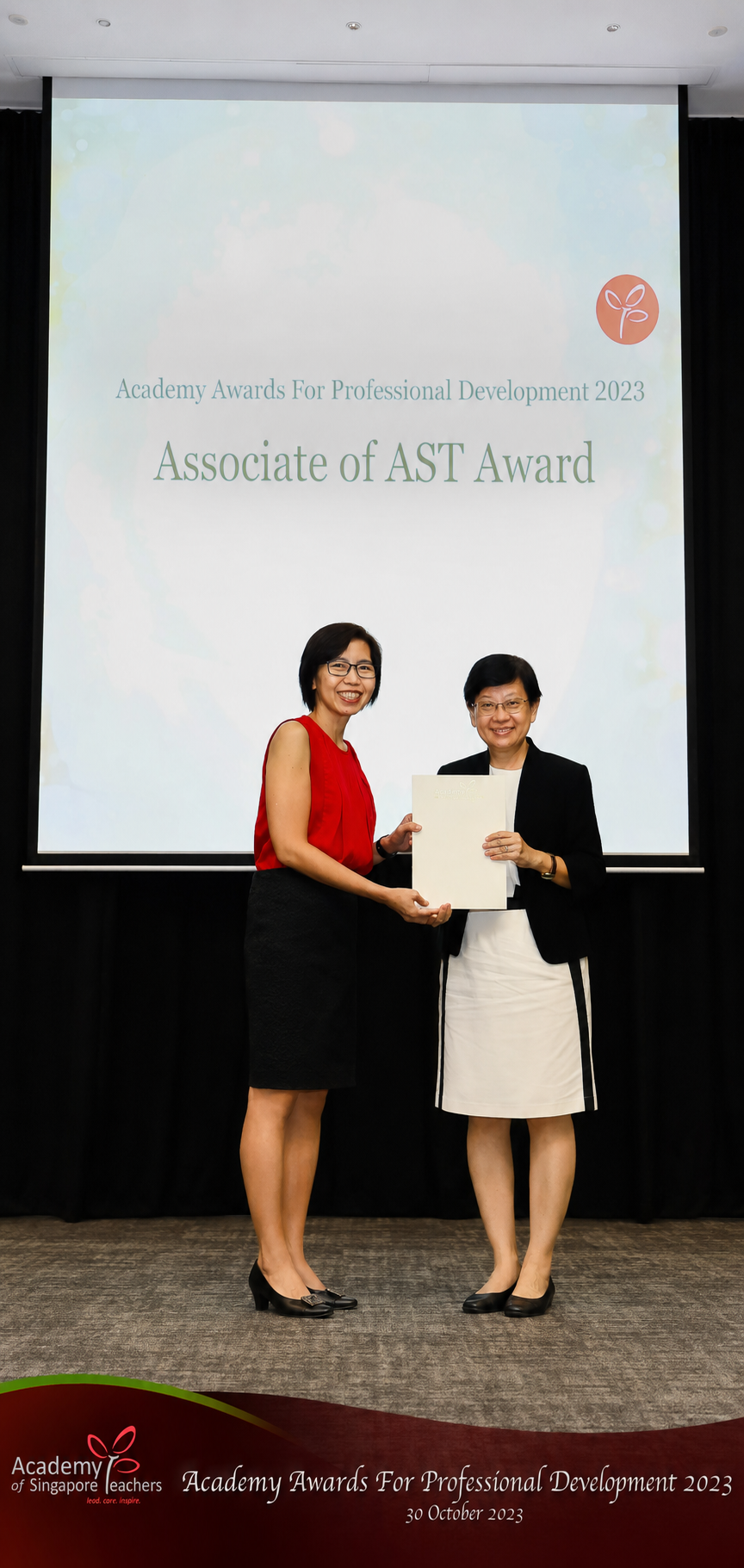 Teacher receiving award